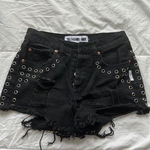 Black Jean Studded shorts with rips SIZE 24. Four buttons like new